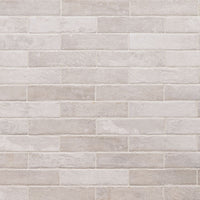 BRICKSTONE CAPELLA IVORY 2 X 10 PORCELAIN TILE.        32pcs/box.    3200/crate.   5.15sqft/box