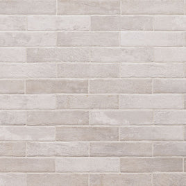 BRICKSTONE CAPELLA IVORY 2 X 10 PORCELAIN TILE.        32pcs/box.    3200/crate.   5.15sqft/box